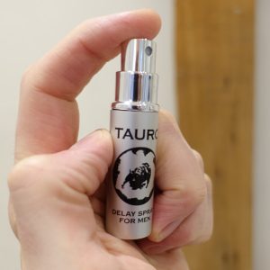 photo of me holding a bottle of tauro spray